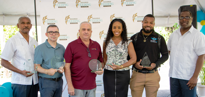 the Bahamas Feeding Network presented plaques to the appreciated